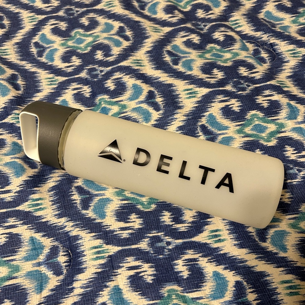Like New Delta White and Gray Glass Water Bottle